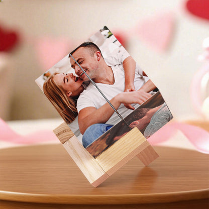 MadeMine personalized photo cube with wooden base, showcasing an infinity folding multiphoto display for custom Father's Day gifts.