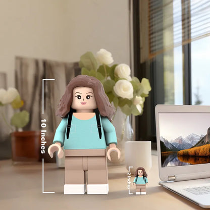 3D printed giant minifigs personalized with custom photo, made by MadeMine, showcasing the unique, large LEGO-style figurines.
