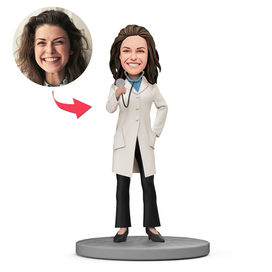 Pediatrician bobblehead met stethoscoop in de hand en gegraveerde tekst, gemaakt door MadeMine, gedetailleerde handgemaakte figuur.