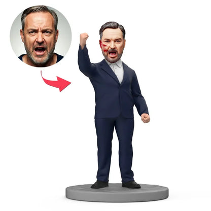 MadeMine Hero Raises Fist zwart pak bobblehead met gegraveerde tekst, gedetailleerde handgemaakte miniatuur van een krachtig figuur