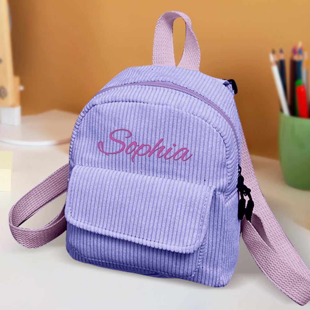 MadeMine personalized mini corduroy backpack with custom name, small school bag for kids, perfect back-to-school gift with colorful design.