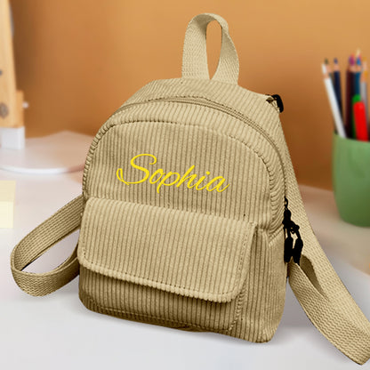 Personalized mini corduroy backpack by MadeMine with custom name, ideal for kids' school and back-to-school gift.