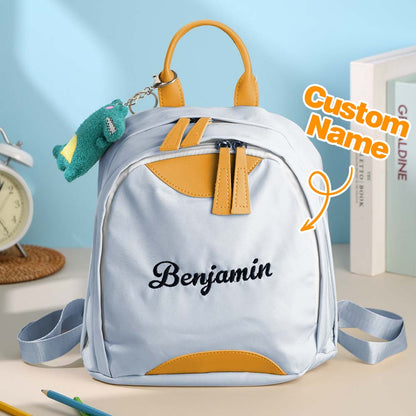 MadeMine personalized mini embroidery backpack for kids with custom name, featuring colorful design and adjustable straps.