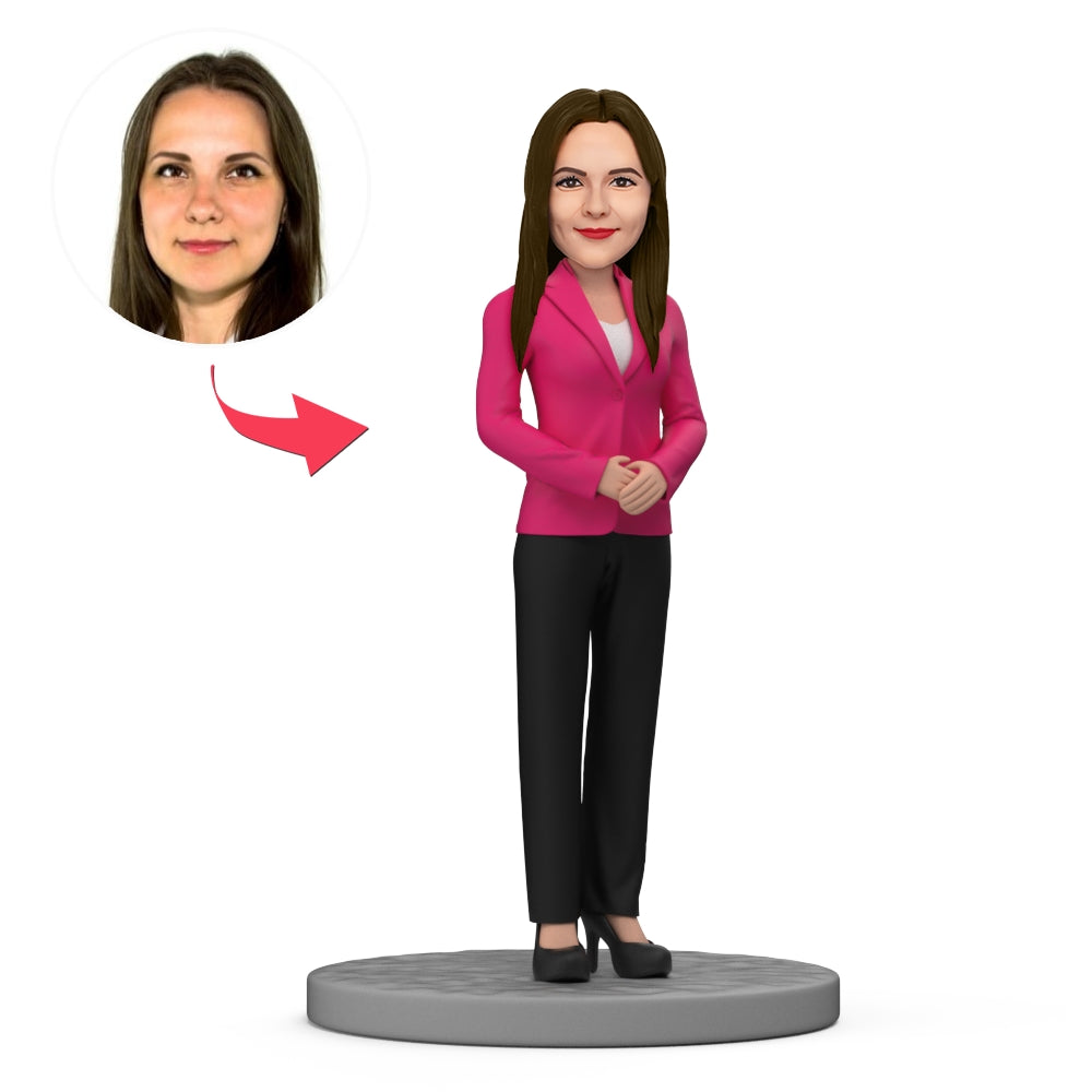 Businesswoman bobblehead in roze zakelijke jurk, gemaakt door MadeMine, met gedetailleerd hoofd en beweegbare bobbelkop.