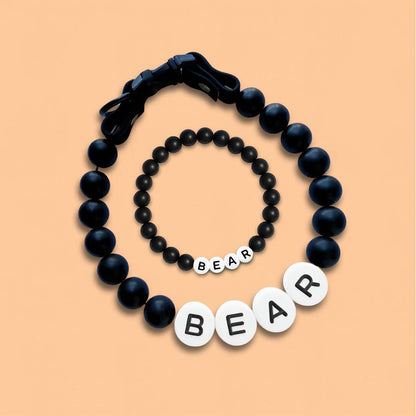 Personalized pet name necklace with matching bracelet by MadeMine, featuring custom engraved pet names on jewelry set.