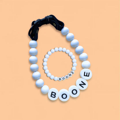Personalized pet name necklace with matching bracelet from MadeMine, featuring custom engraved pet names on jewelry set.
