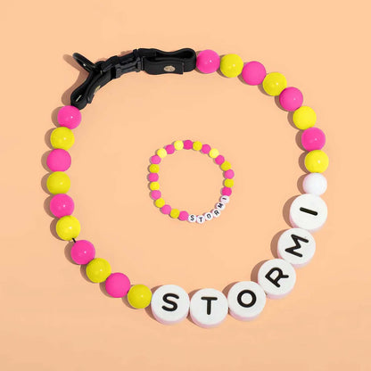 Personalized pet name necklace with matching bracelet by MadeMine, featuring custom engraved pet names and stylish jewelry design.