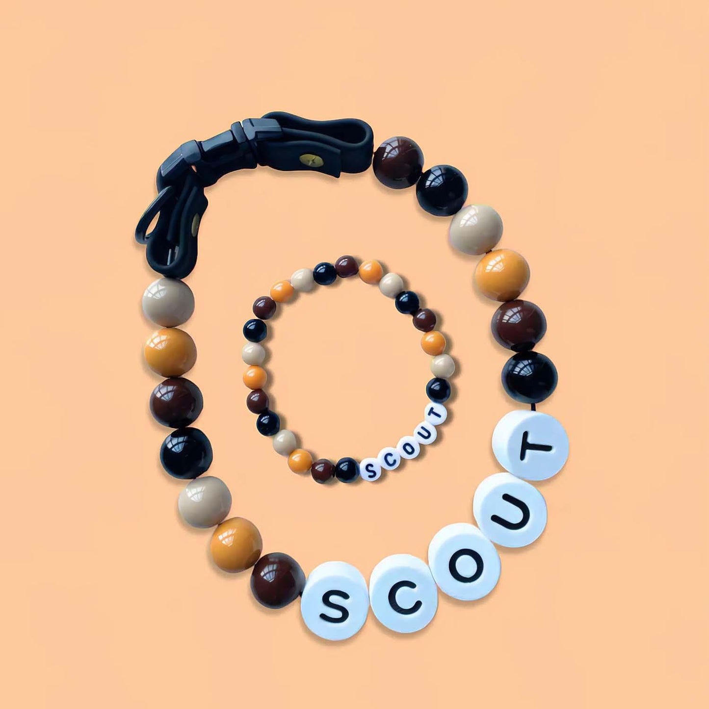 Personalized pet name necklace and matching bracelet by MadeMine, featuring custom pet name charms and elegant jewelry design.