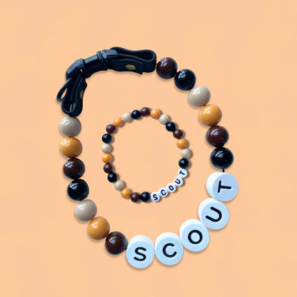 Personalized pet name necklace and matching bracelet by MadeMine, featuring custom pet name charms and elegant jewelry design.