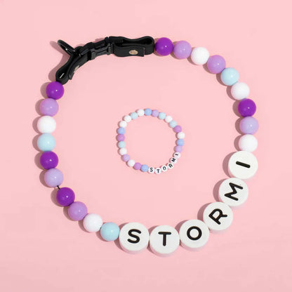 Personalized pet name necklace with matching bracelet from MadeMine, featuring custom engraved pet names on jewelry pieces.