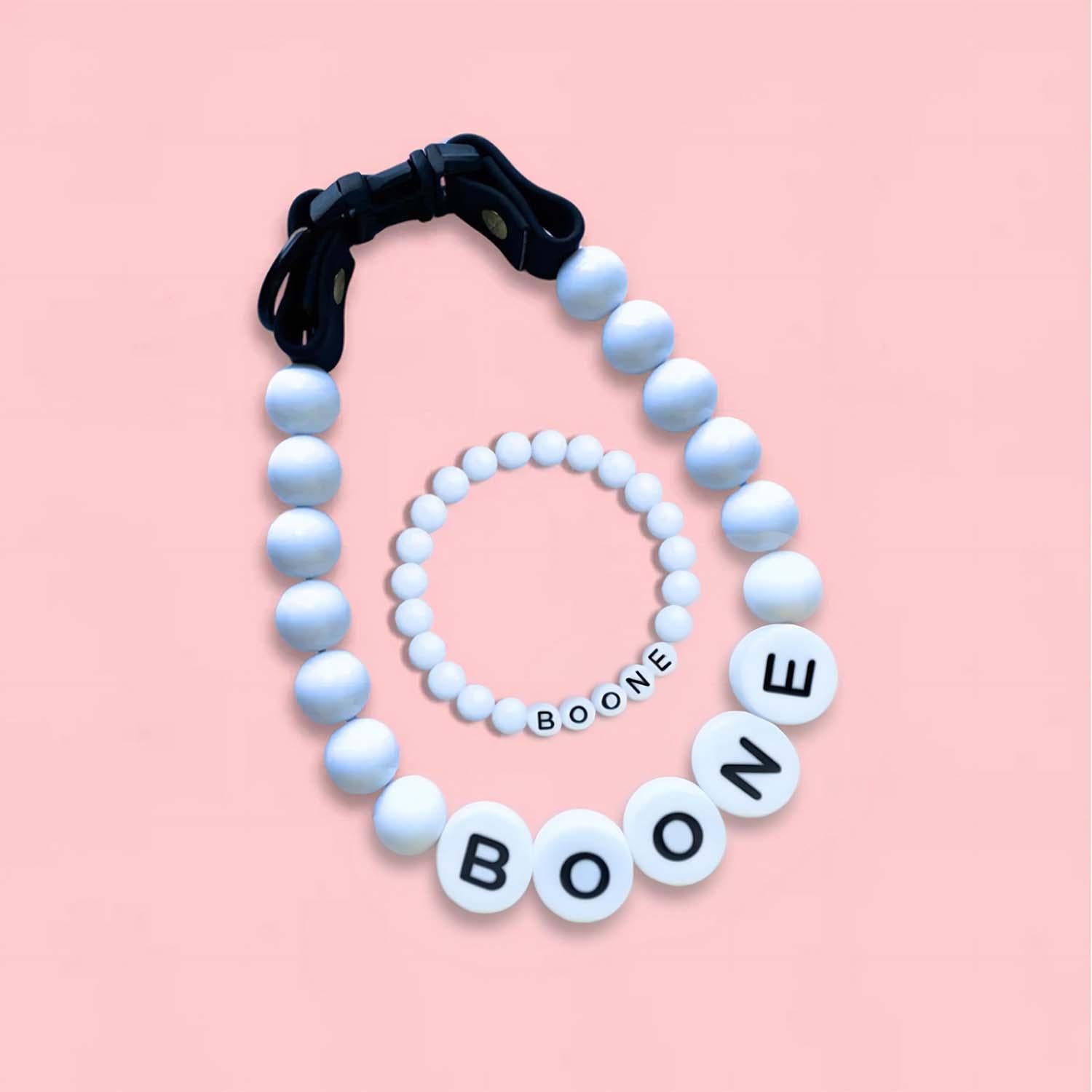 Personalized pet name necklace with matching bracelet from MadeMine, featuring custom engraved pet names on jewelry set.