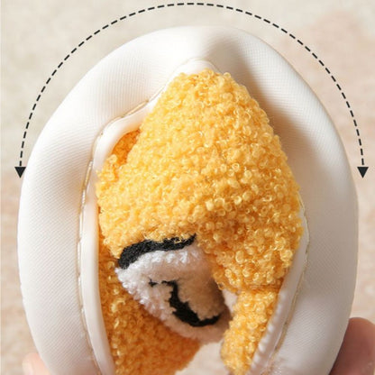 Fuzzy smiley face cotton slippers by MadeMine, warm and cozy house slippers for women and men with fluffy, soft soles.