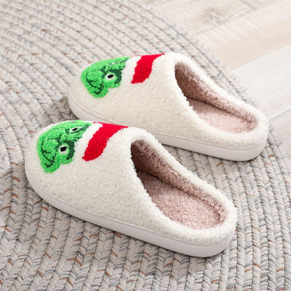 MadeMine Christmas Grinch slippers with cotton material and festive design, perfect for cozy holiday home footwear.