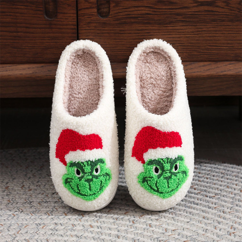 MadeMine Christmas Slippers featuring Grinch design, cozy cotton material, ideal for holiday home wear.