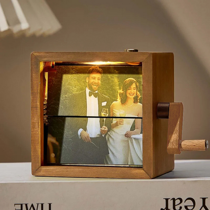 MadeMine custom photo flipbook frame with hand-crank mechanism and built-in light, showcasing personalized animated photo display.