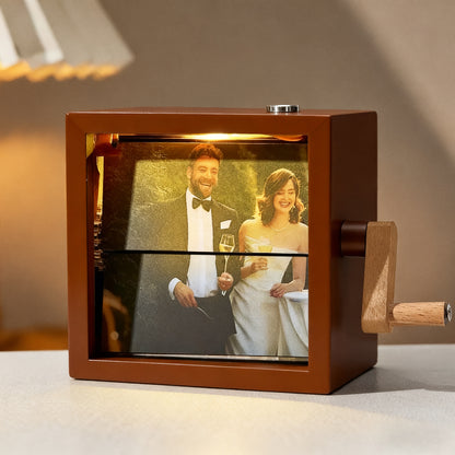 MadeMine personalized photo flipbook frame with hand-crank animation, featuring a lighted display for custom photo animations.