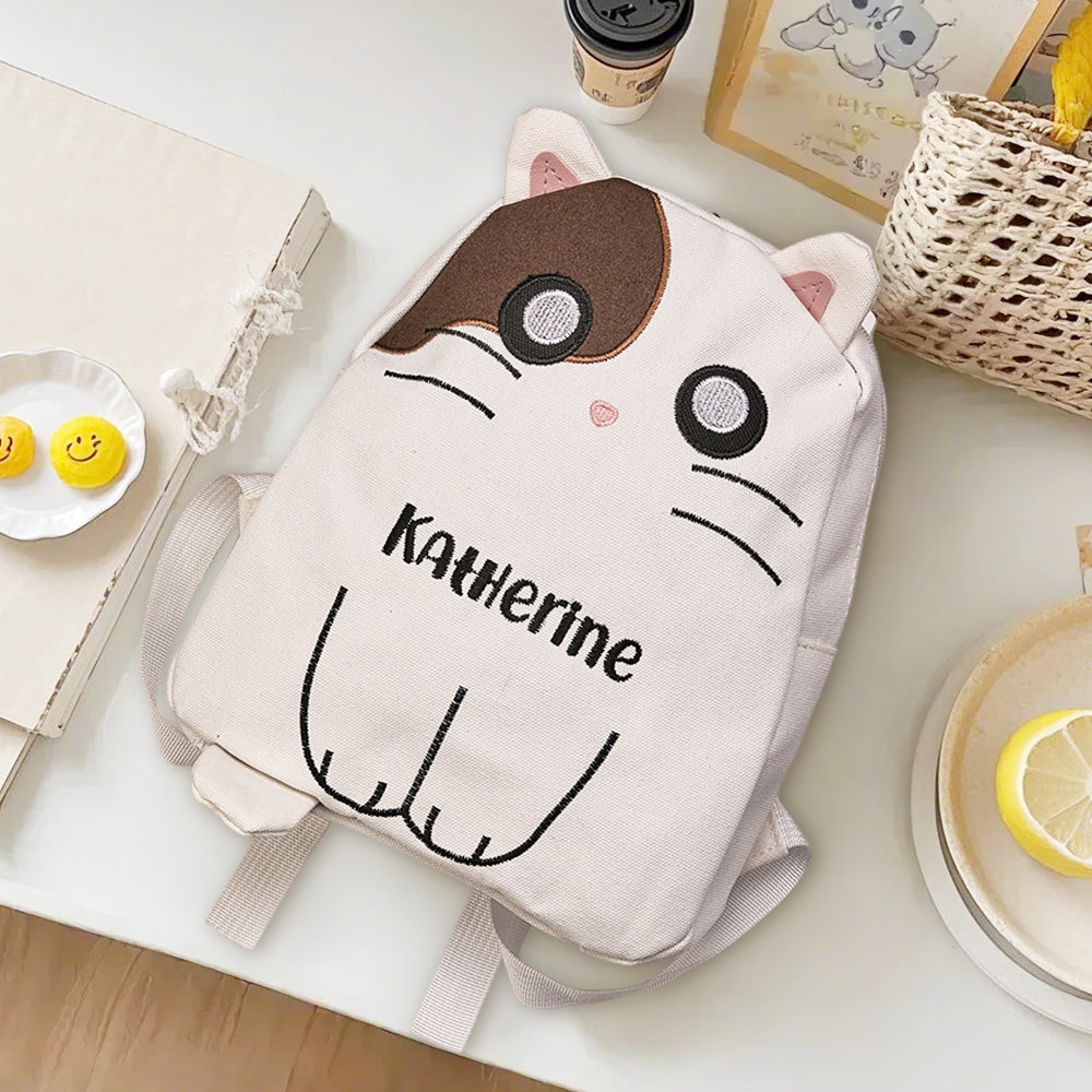 MadeMine personalized cat embroidery backpack for kids with custom name, durable school bag suitable for children.