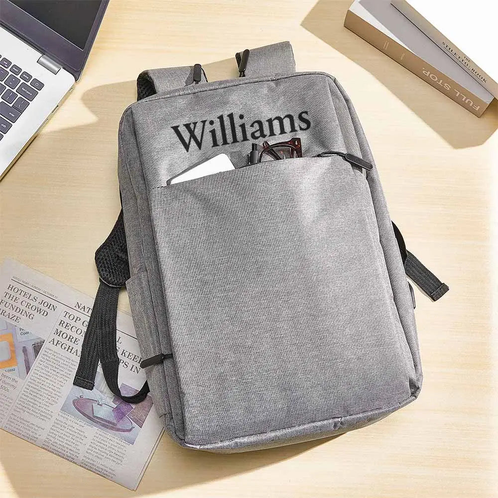 MadeMine personalized name laptop backpack for men and women, fits 15.6-inch laptops, with customizable design and multiple compartments.